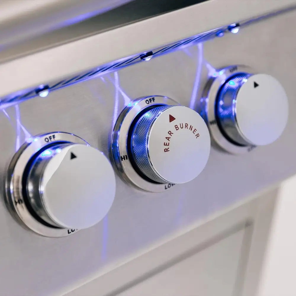 Close-up of Summerset gas grill control knobs with blue LED lighting