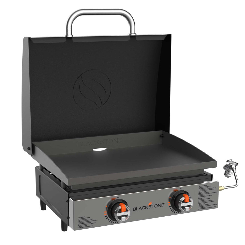 Front view of Blackstone 22" tabletop griddle with stainless steel hood and dual burner controls