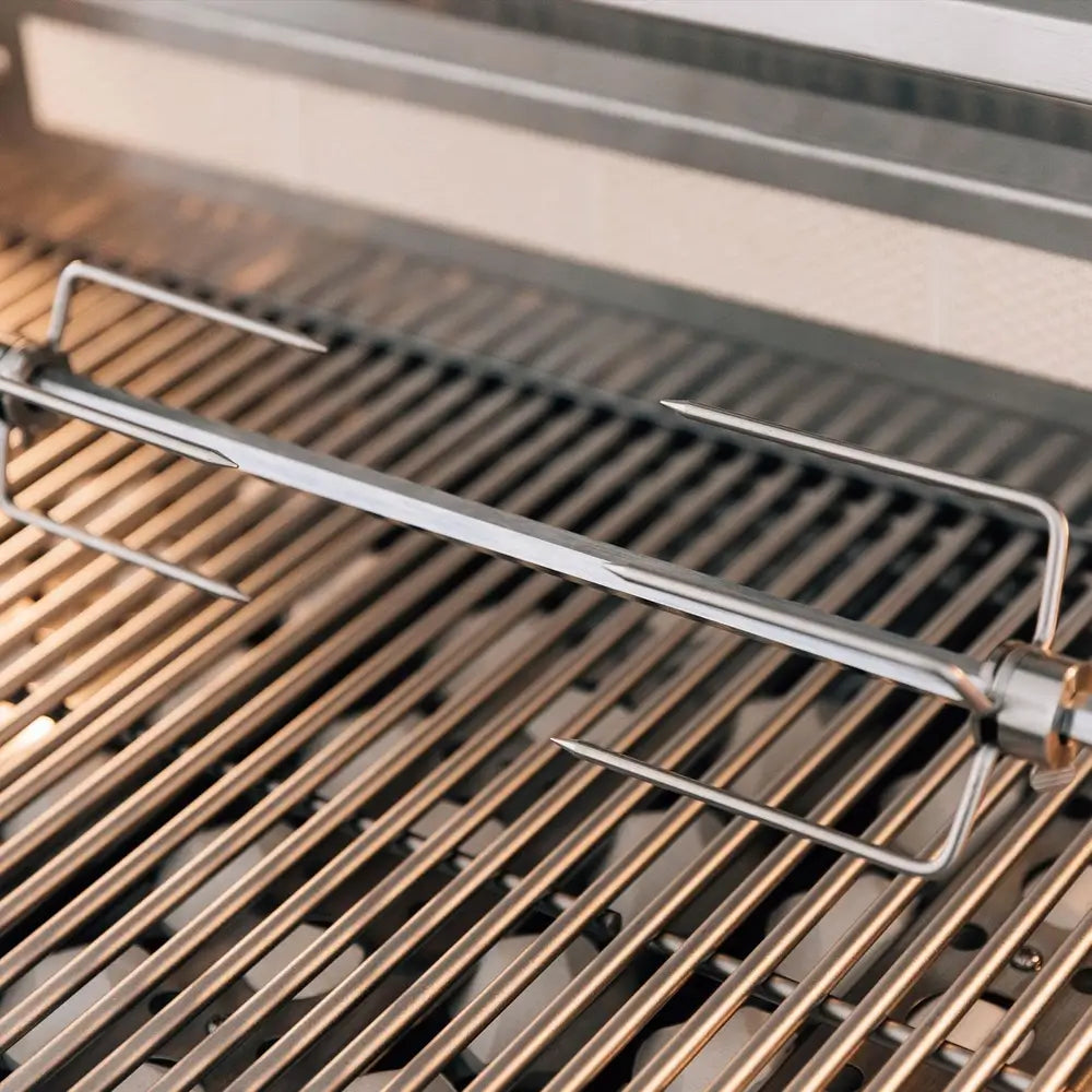 Stainless steel rotisserie spit rod inside Summerset built-in gas grill
