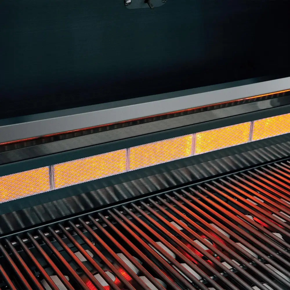 Close-up of Summerset grill infrared rear burner glowing orange for rotisserie cooking