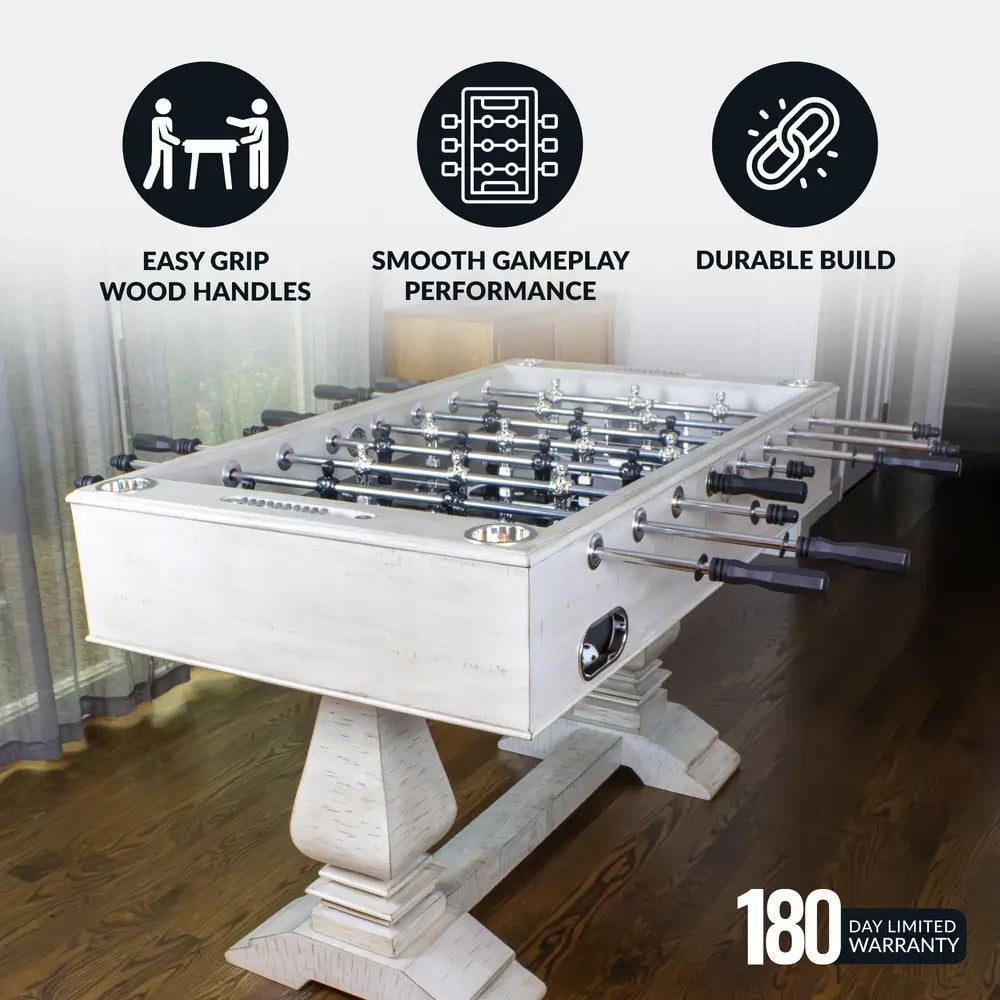 Foosball table with icon overlays for easy-grip wood handles, durable build, and smooth gameplay, shown with 180-day limited warranty badge.