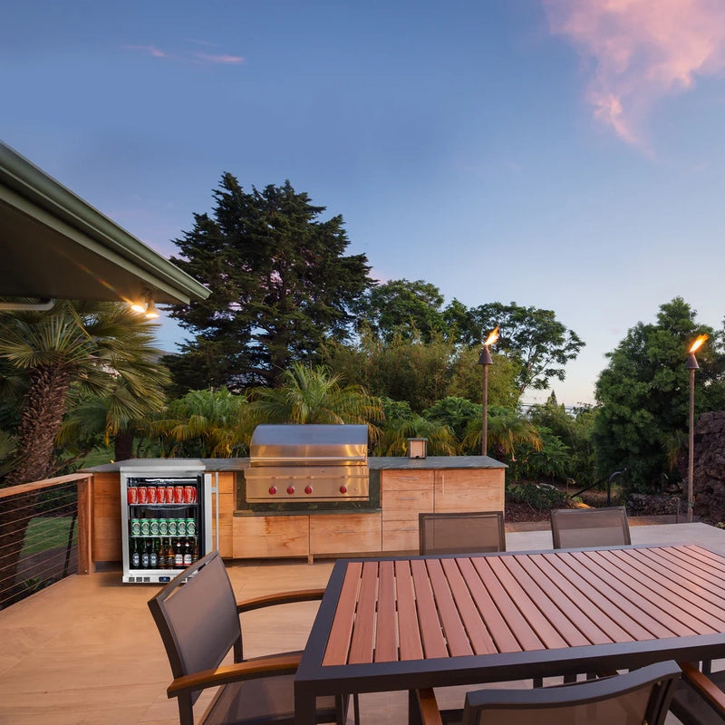 KingsBottle KBU55ASD outdoor kitchen lifestyle image showcasing the beverage fridge in a patio setting.