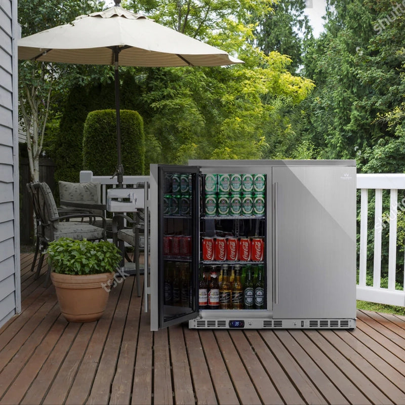 KingsBottle KBU56ASD outdoor beverage fridge integrated in luxury patio kitchen with grill and canopy.