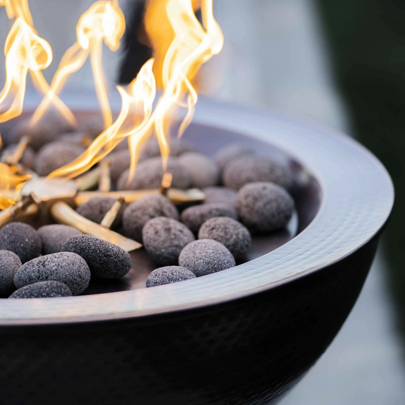 The Outdoor Plus Sedona Hammered Patina Copper Fire Bowl with Lava Rock and fire