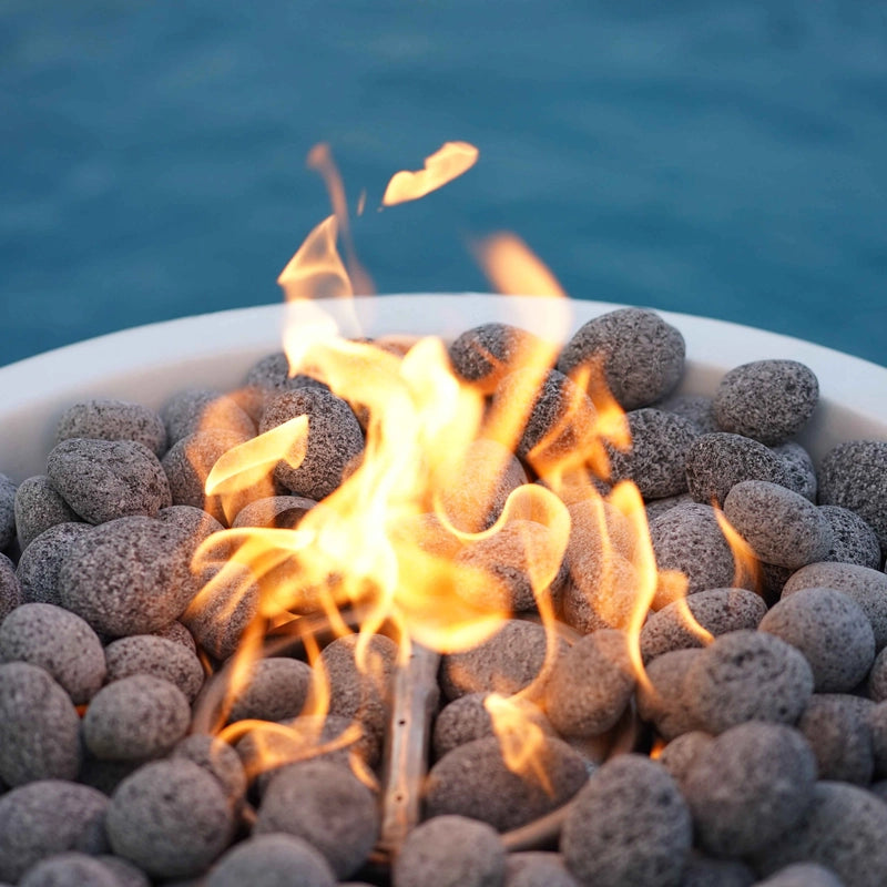 The Outdoor Plus Sedona GFRC Concrete Fire Bowl Lava Rock with Fire closeup