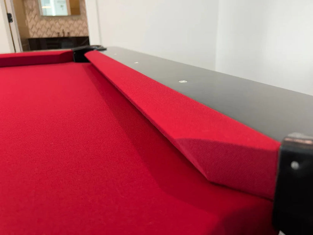 Rail view of White Billiards Neavio modern pool table featuring red felt