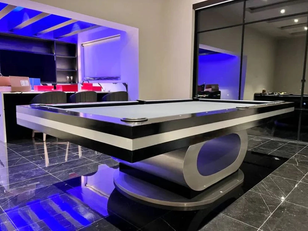 Angled view of White Billiards Sierra pool table with modern white felt and chrome accents