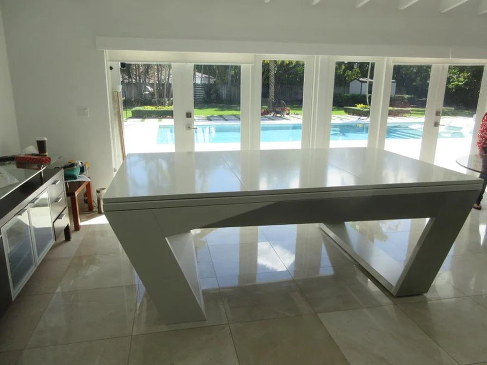 Sleek side view of White Billiards Valenti white pool table with closed tabletop cover