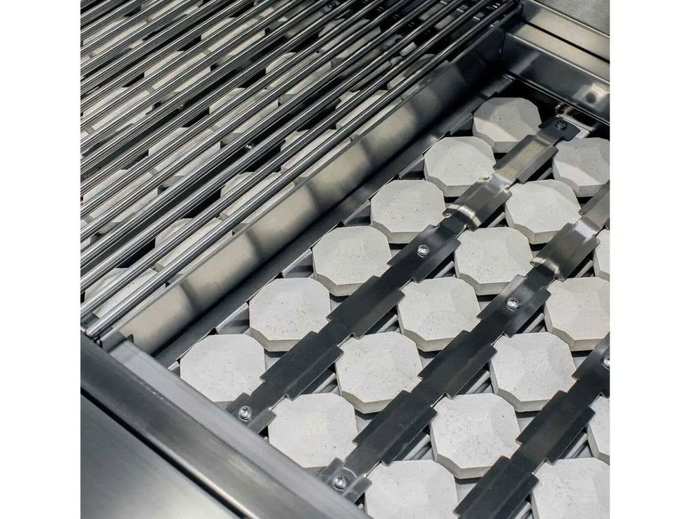 Infrared ceramic briquette system inside luxury stainless steel gas grill.
