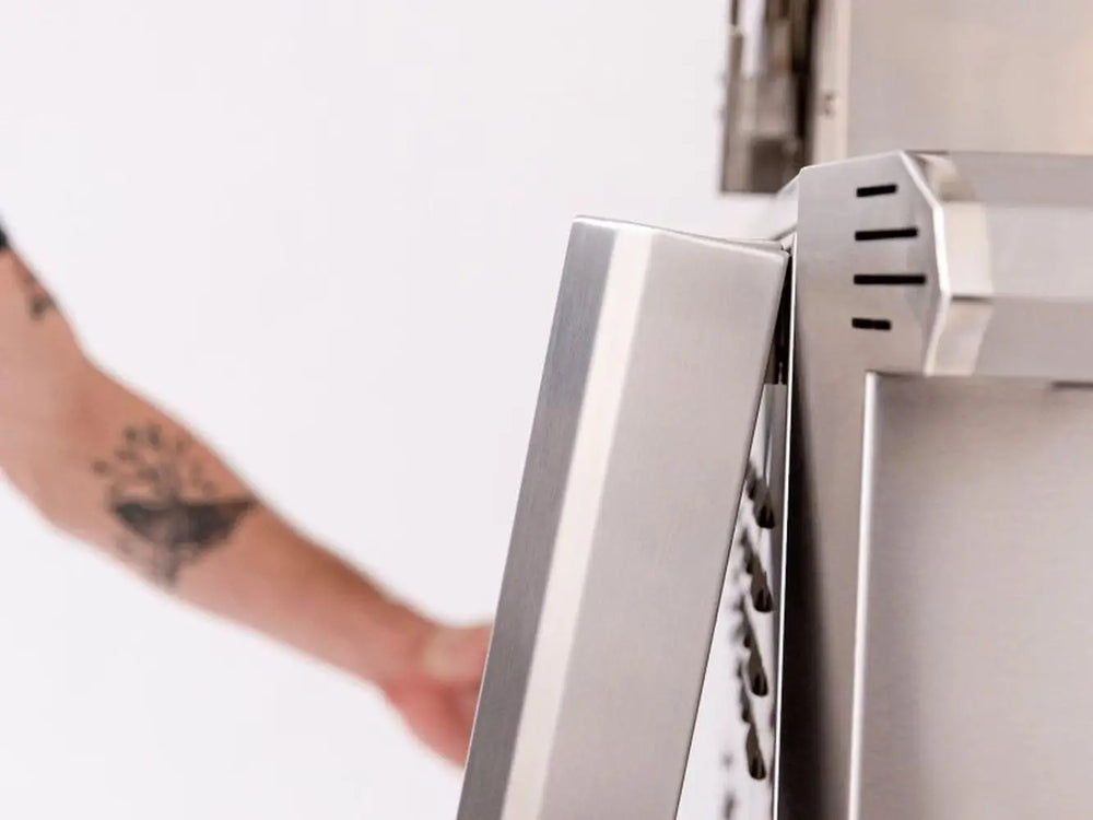 Opening stainless steel grill hood with ergonomic handle