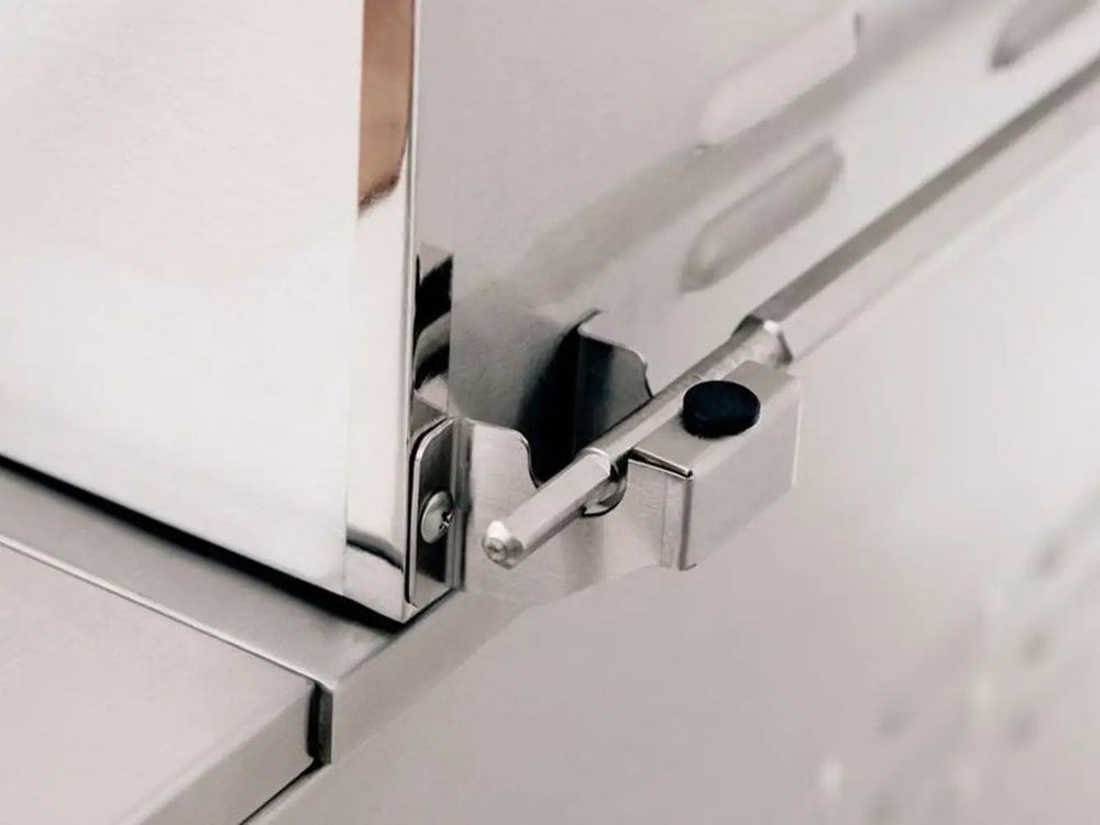 Heavy-duty stainless steel grill hood latch close-up