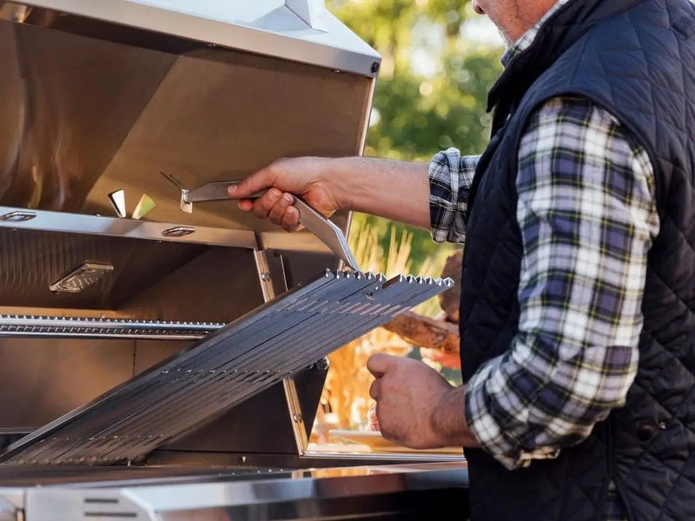 Removing stainless steel cooking grates from outdoor grill