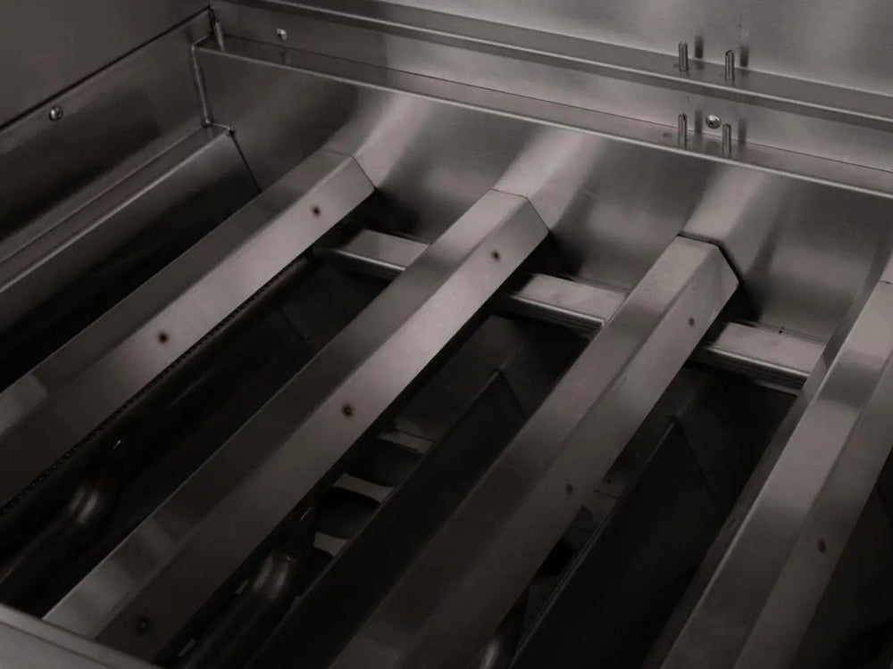 Stainless steel burners inside professional outdoor gas grill