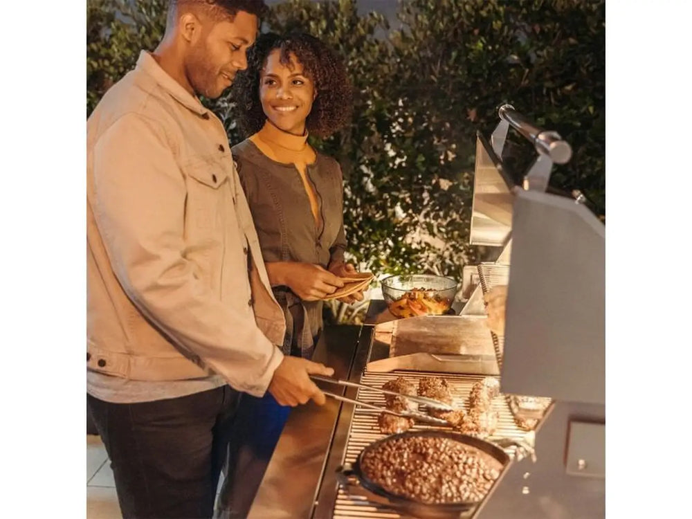 Couple Grilling using American Made Grills