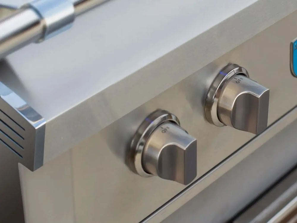 Stainless steel control knobs on luxury outdoor gas grill