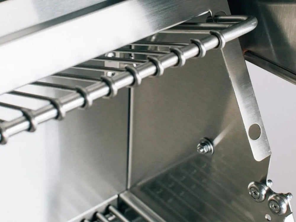 Stainless steel warming rack inside premium outdoor gas grill