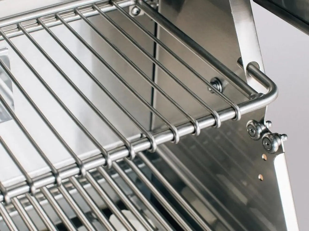 Upper warming rack inside stainless steel gas grill