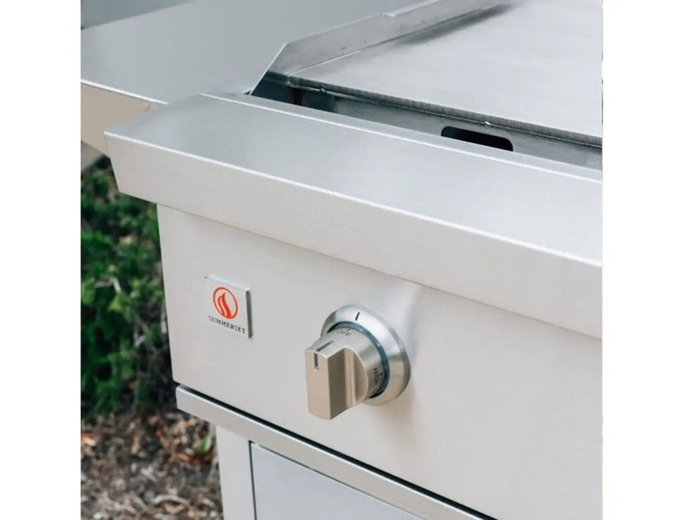 Outdoor griddle side view showing stainless steel body and control knob
