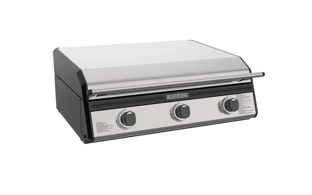 Blackstone 28-Inch Drop-In Griddle with stainless steel hood closed, built for outdoor kitchens and propane configuration