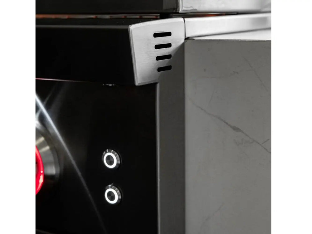 Side vent and illuminated control buttons on a premium outdoor gas grill.