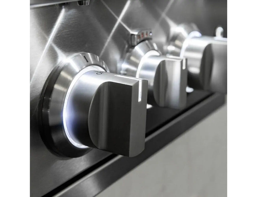 Close-up of stainless steel grill control knobs with white LED backlighting.