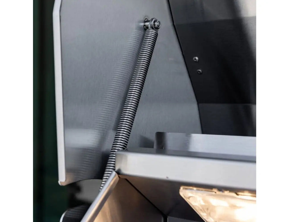 Heavy-duty spring-assisted stainless steel grill hood hinge for smooth opening and closing.