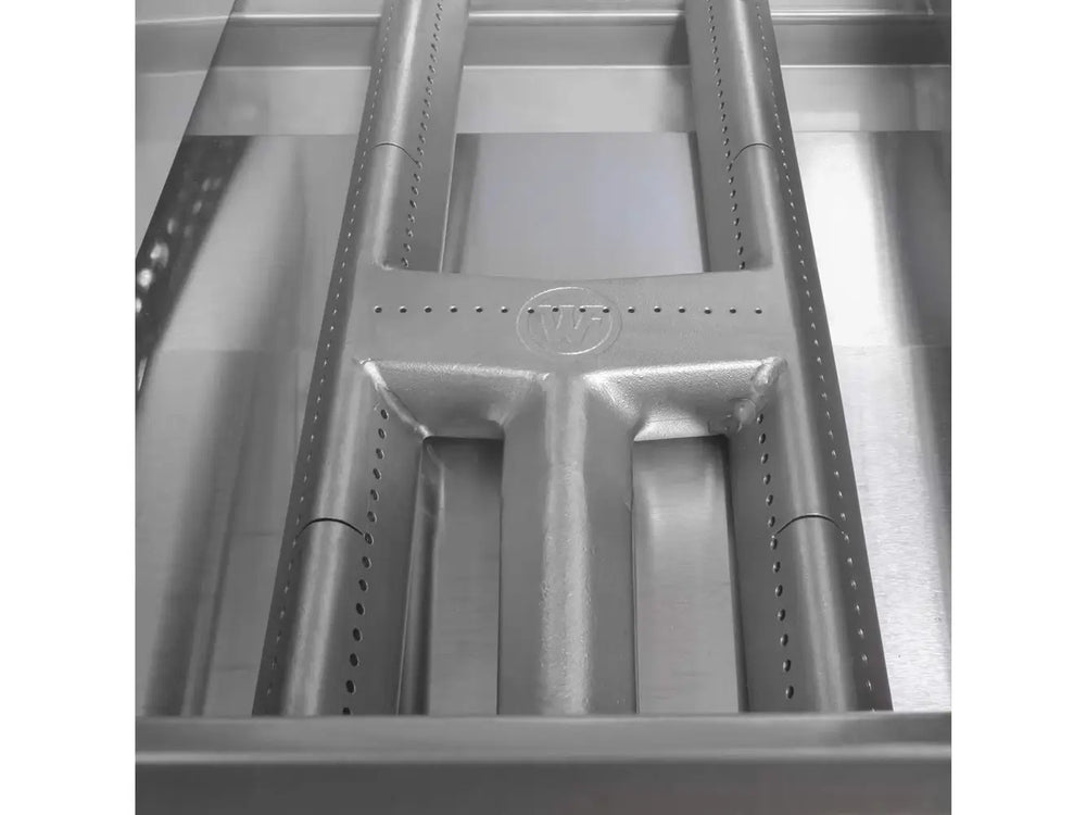 Close-up of Wildfire grill stainless steel U-shaped burner