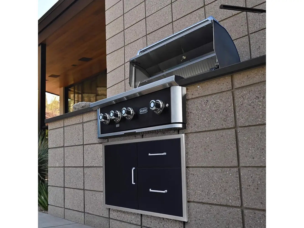 Wildfire 36-Inch Gas Grill installed in outdoor kitchen island, stainless steel hood open
