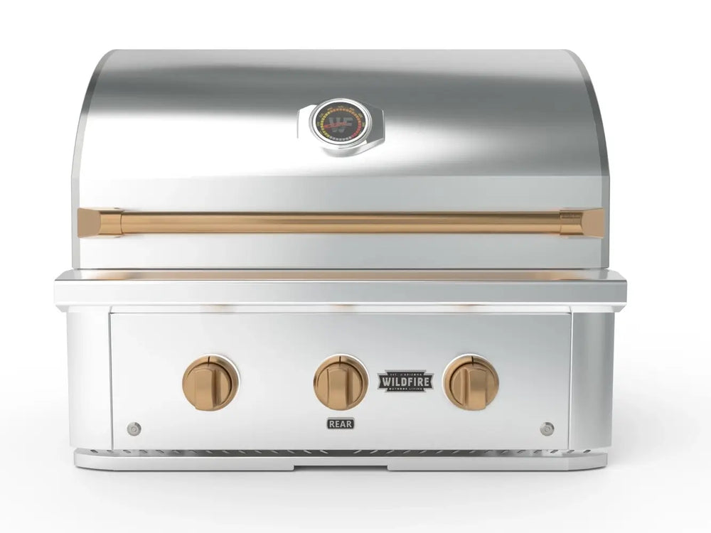 Wildfire 30-Inch Built-In Gas Grill with gold-trimmed knobs and handle, stainless steel hood closed