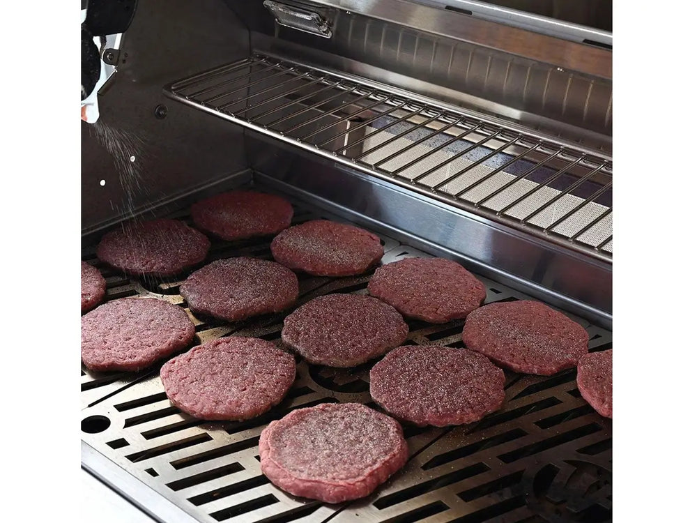 Close-up of Wildfire 36-Inch Gas Grill cooking burgers on stainless steel grates