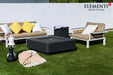 Elementi Plus Bergamo OFG419DG dark gray fire table in outdoor lounge with cushioned seating.