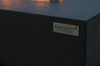 Macro detail of Roraima fire table handcrafted slate black GFRC stone finish.