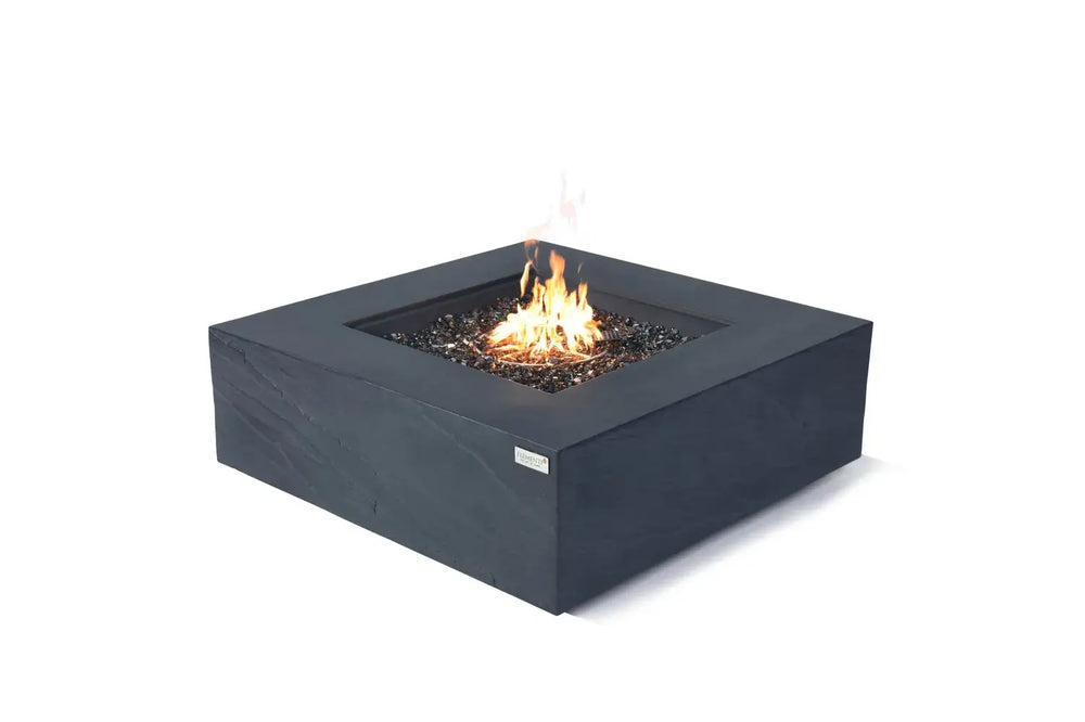 60,000 BTU Roraima slate black fire table with linear flame on white background.