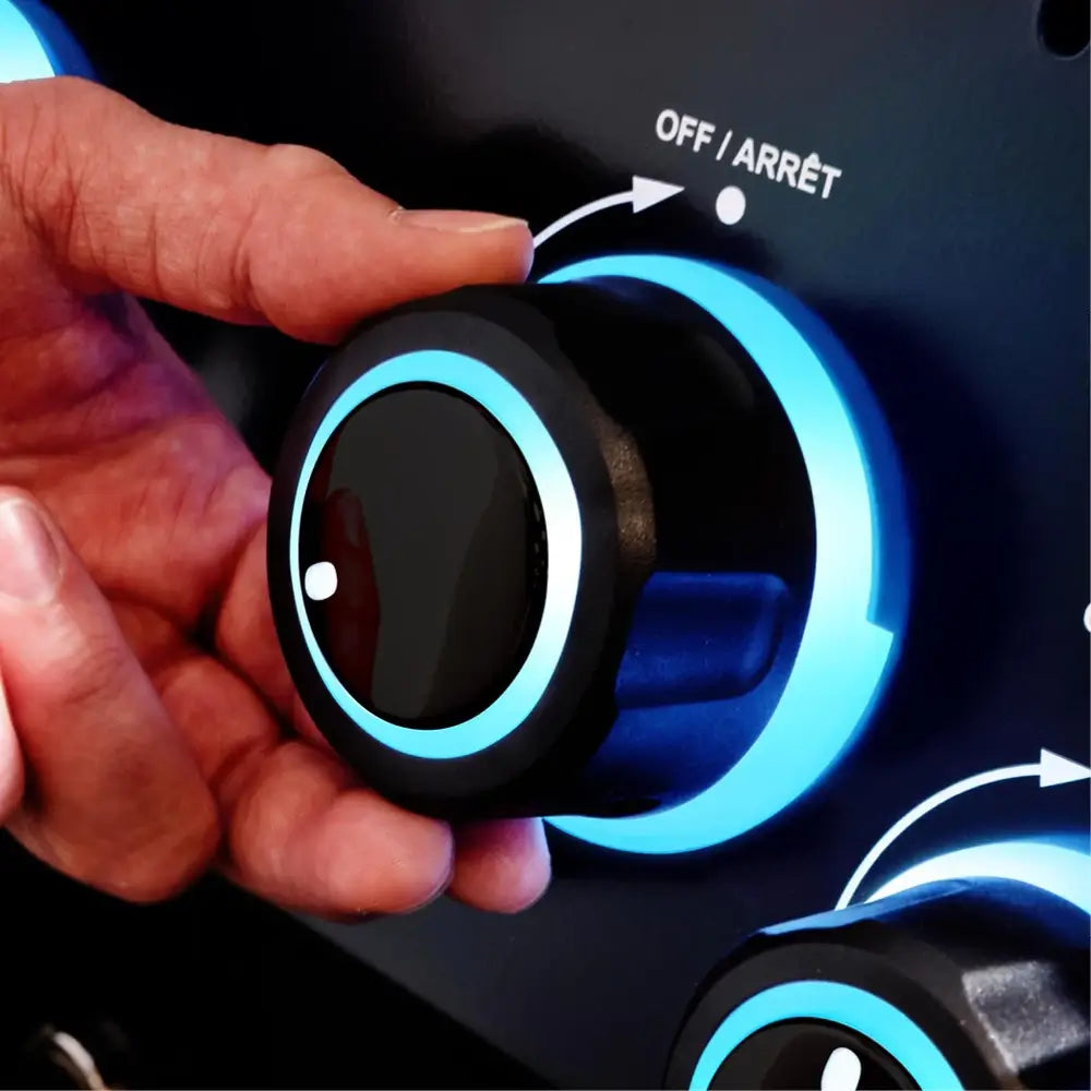 Detail view of the blue LED backlit Sensi-Touch control knob on a Broil King Baron 420 Shadow gas grill.