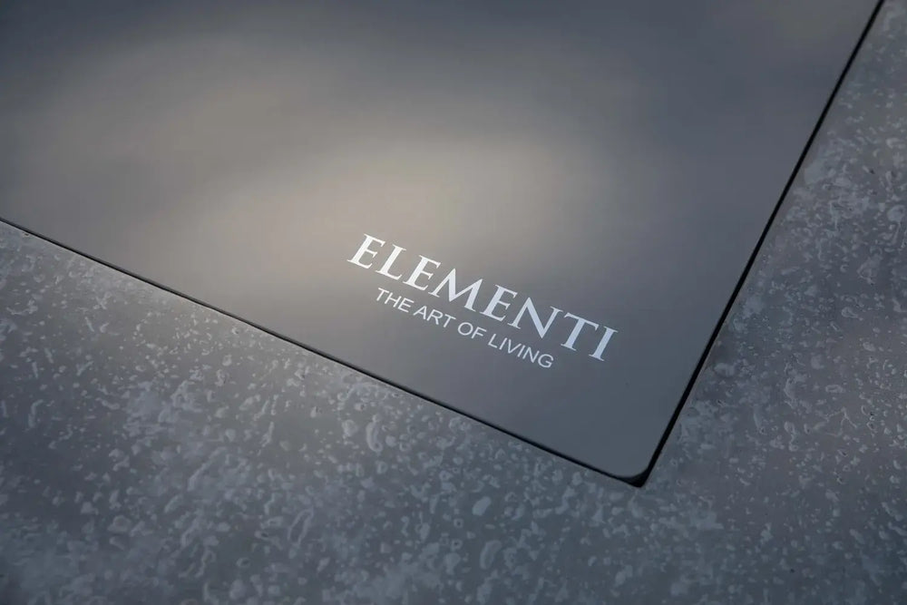 Macro detail of Victoria fire table handcrafted space gray GFRC stone finish.