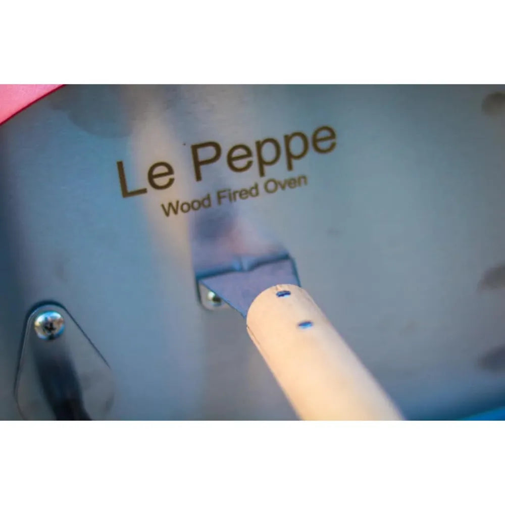 Rear view of the WPPO Le Peppe portable pizza oven showing the fuel loading area and handle.