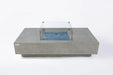 Elementi Plus Monte Carlo fire table with glass wind guard and blue fire glass on white background.