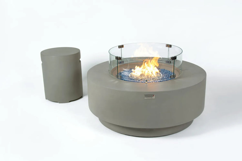 Elementi Plus Colosseo OFG414LG light gray fire table with glass wind guard and matching propane tank cover.