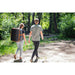 Person Holding the Top Handle of the Blackstone Tabletop Griddle Backpack – Lightweight and Travel-Friendly Design for Camping