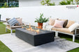Close-up of Cape Town fire table glass wind guard and slate black GFRC texture.