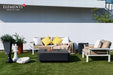 Elementi Plus Bergamo dark gray square fire table on modern patio with outdoor sofa and chairs.