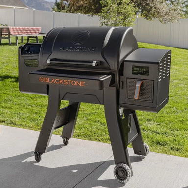 Blackstone 2258 Smoker Airfryer Combo full front view with closed drawers and griddle top