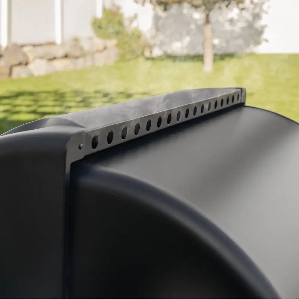 Rear view of Blackstone 2258 smoker air fryer grill combo highlighting smoke vents and power input