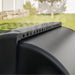 Rear view of Blackstone 2258 smoker air fryer grill combo highlighting smoke vents and power input