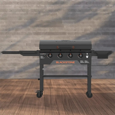 Blackstone 36-inch stainless steel omnivore griddle with cabinet and 5 burners – premium outdoor propane flat top grill for backyard cooking.