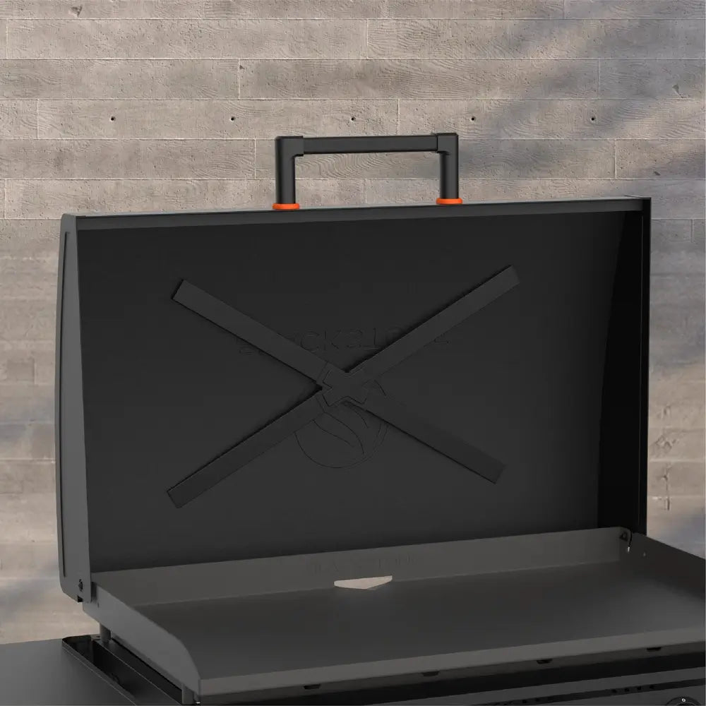 Interior view of Blackstone griddle lid with reinforced X-bracing for durability and premium construction.