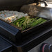 Vegetables and rice sizzling on Blackstone 28-Inch Drop-In Griddle with precision cooking and even heat distribution
