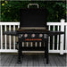 Blackstone 28" griddle with hood set up on deck with open lid and triple burner controls in view