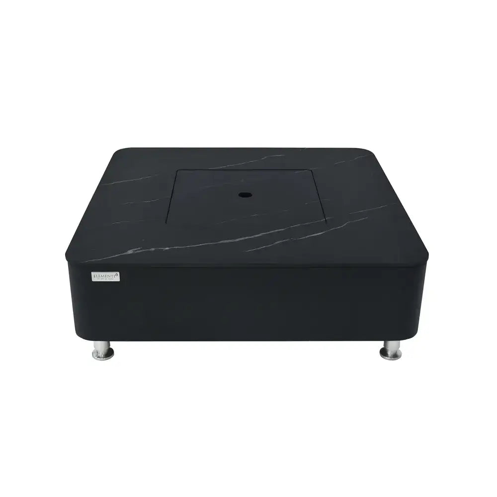 Elementi OFP101BB black marble porcelain fire table with matching lid and stainless steel legs on a white background.