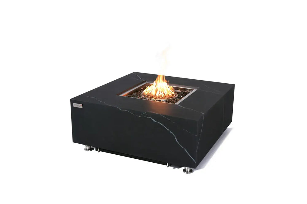 Studio shot of the Elementi Plus Bulgaria Black fire table on a white background, featuring a 60,000 BTU linear flame burning over dark reflective fire glass.